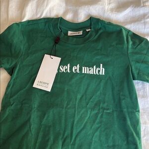 Lacoste Graphic Tee with “jeu, set et match”. Game, set, and match in French